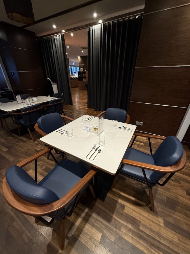Restaurant table set for breakfast at Hilton Cologne