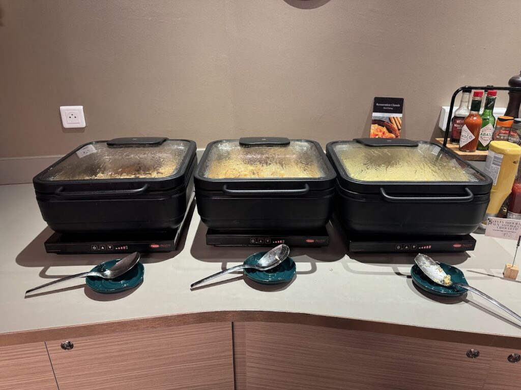 Hot food trays at Canopy VIP Lounge Nice buffet