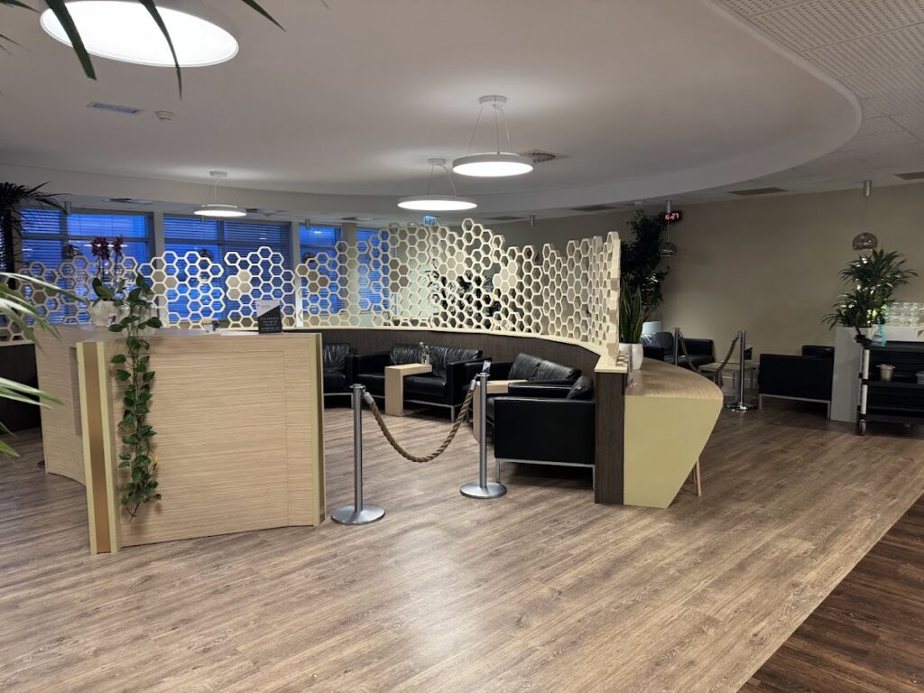 Open seating area with sofas and honeycomb dividers