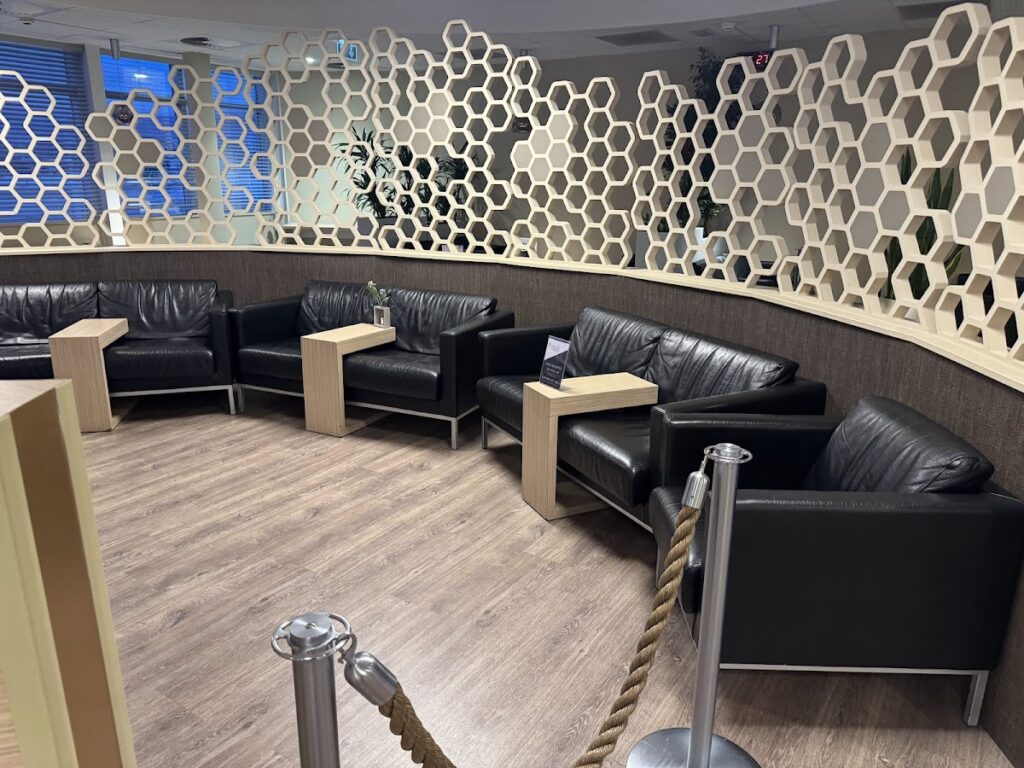 Black armchairs in Canopy VIP Lounge Nice seating area