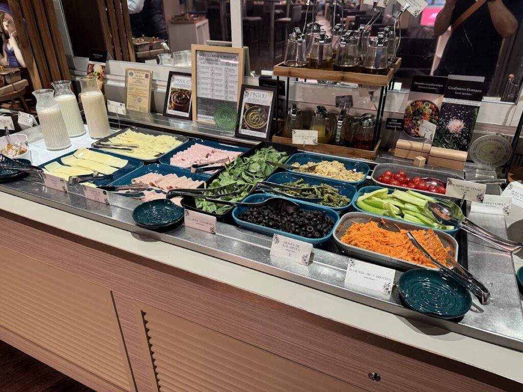 Fresh salad buffet with vegetables and cold toppings