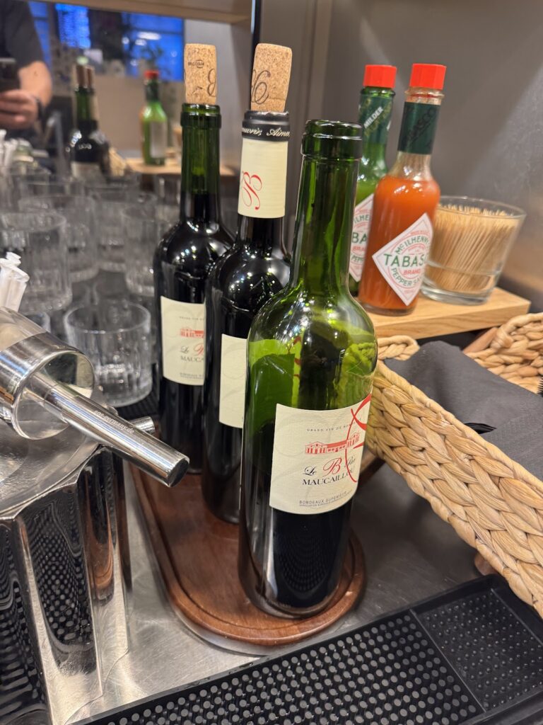 Wine bottles and condiments at lounge bar
