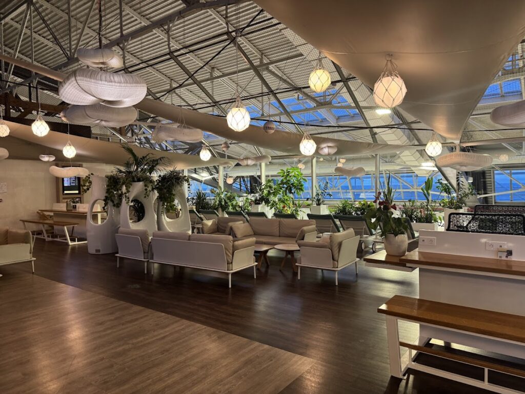 Canopy VIP Lounge Nice seating area with plants