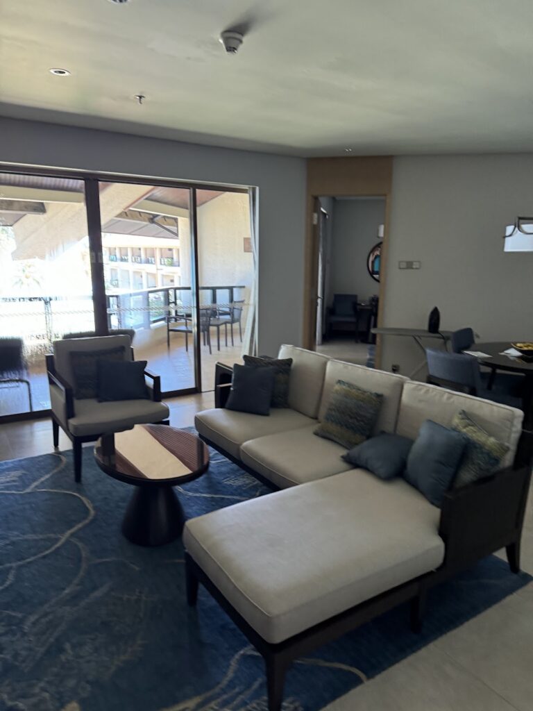 Executive Seaview Suite lounge with balcony doors