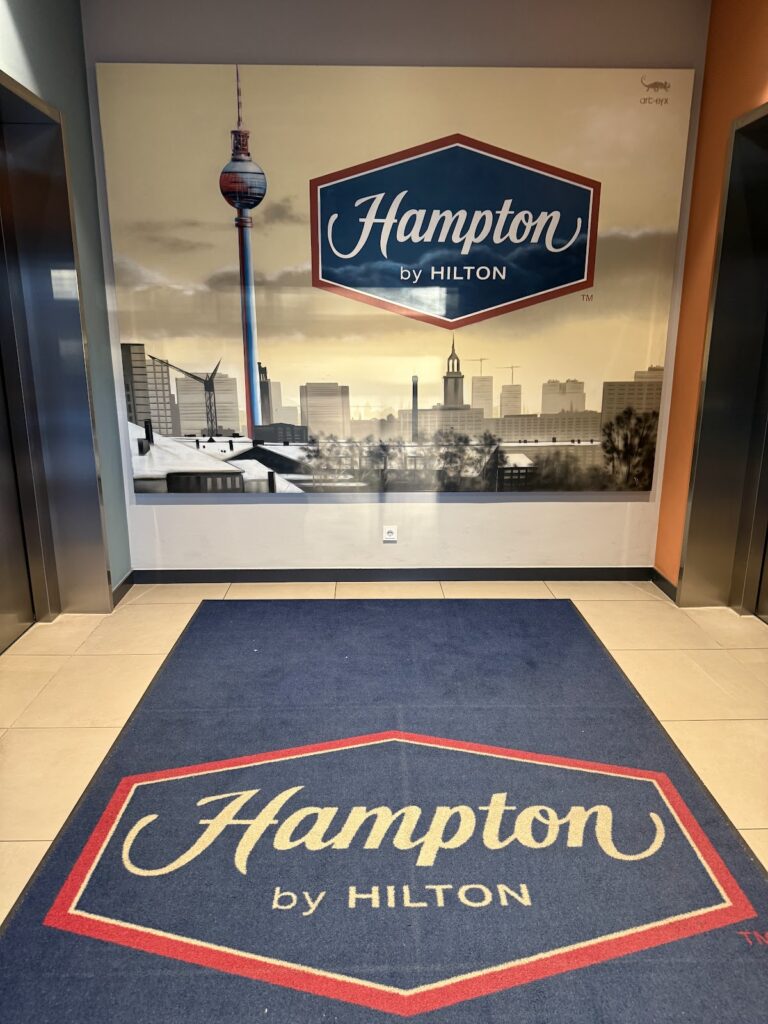 Hampton Berlin Alexanderplatz lobby branding and entrance mat