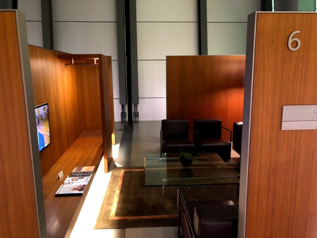 Private family room with television and lounge chairs