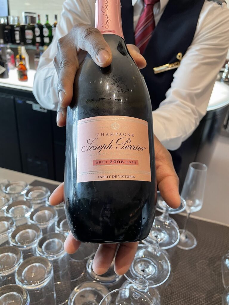 Champagne service at Qatar Airways Al Safwa First Class Lounge