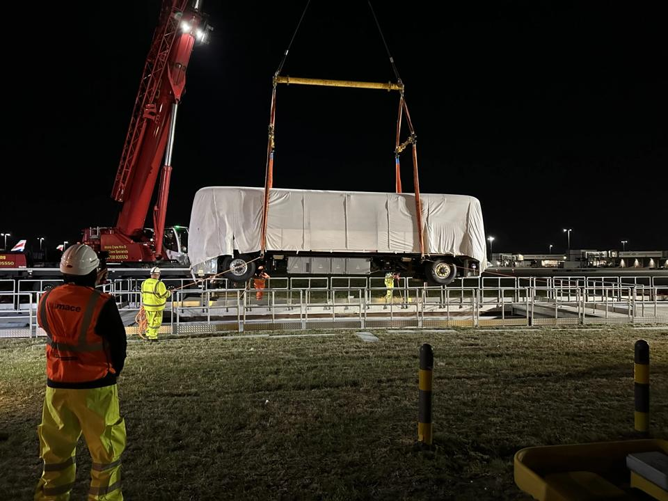 New Heathrow T5 transit trains being winched onto the tracks below ground