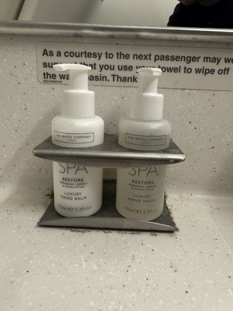 White Company hand wash and balm in A320 lavatory