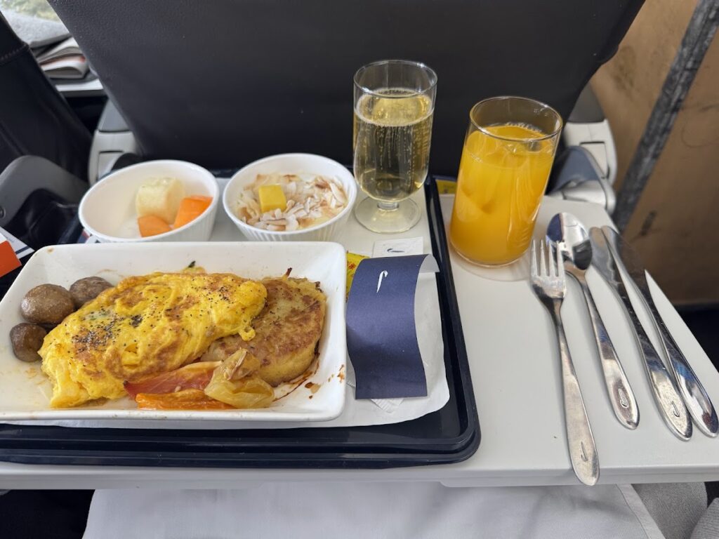 Club Europe breakfast omelette with champagne and juice