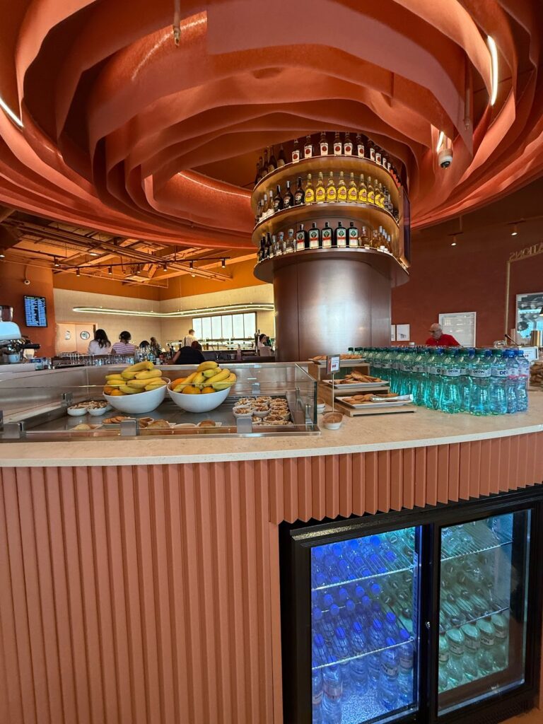 Buffet counter with fruit, pastries and water at Sofia lounge