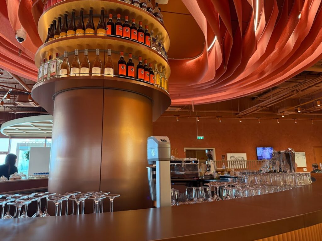 Wine display tower above bar in Sofia lounge