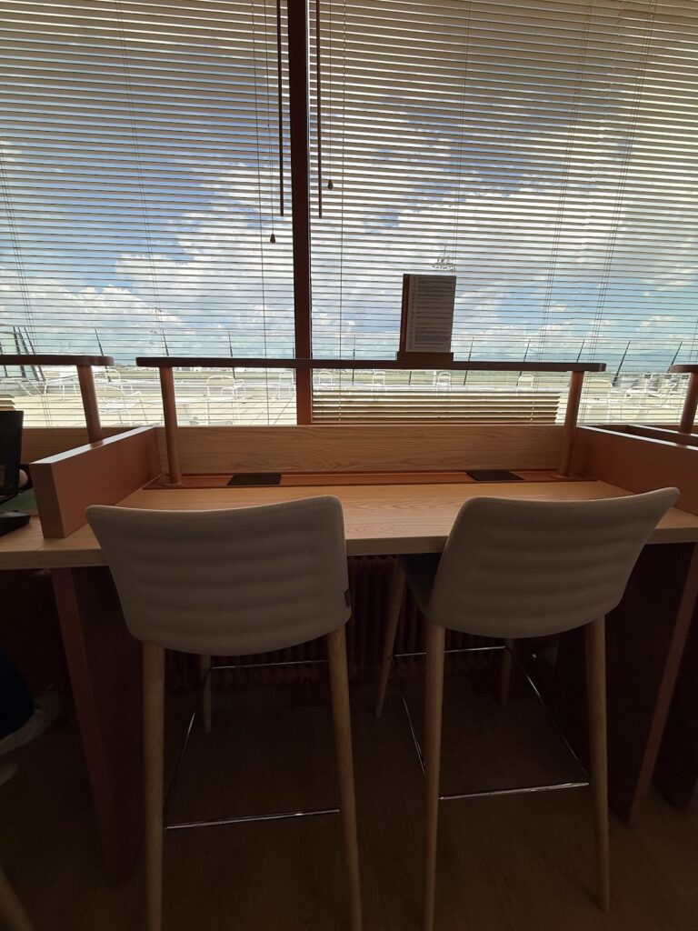 High bar seating with apron view through window blinds