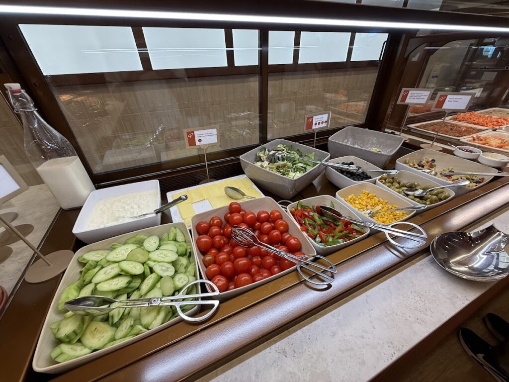Salad buffet with cucumber, tomatoes and olives