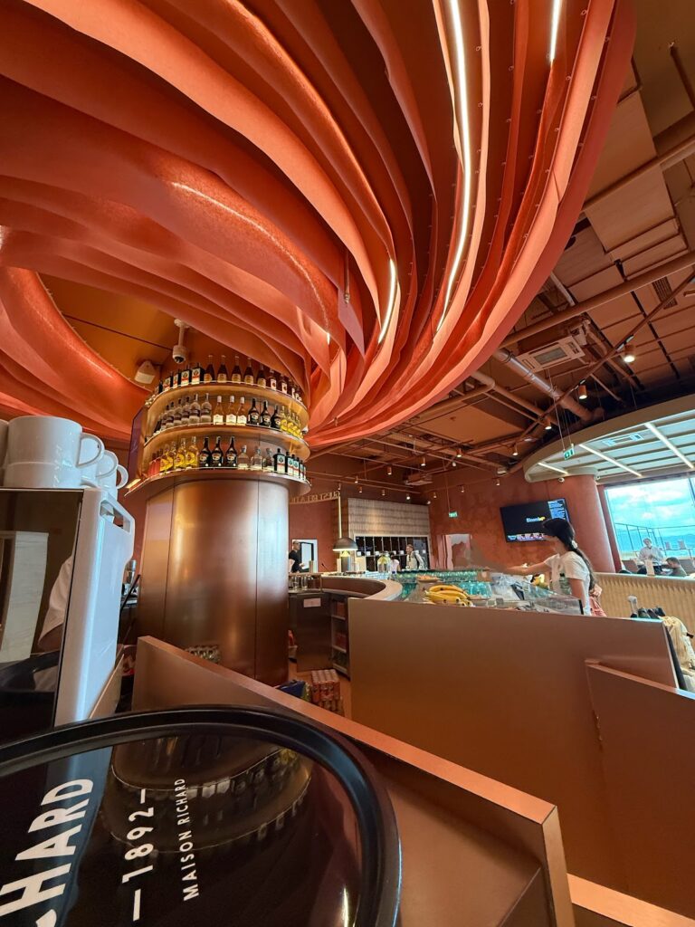 Sculptural orange ceiling above bar in Primeclass Lounge Sofia Airport