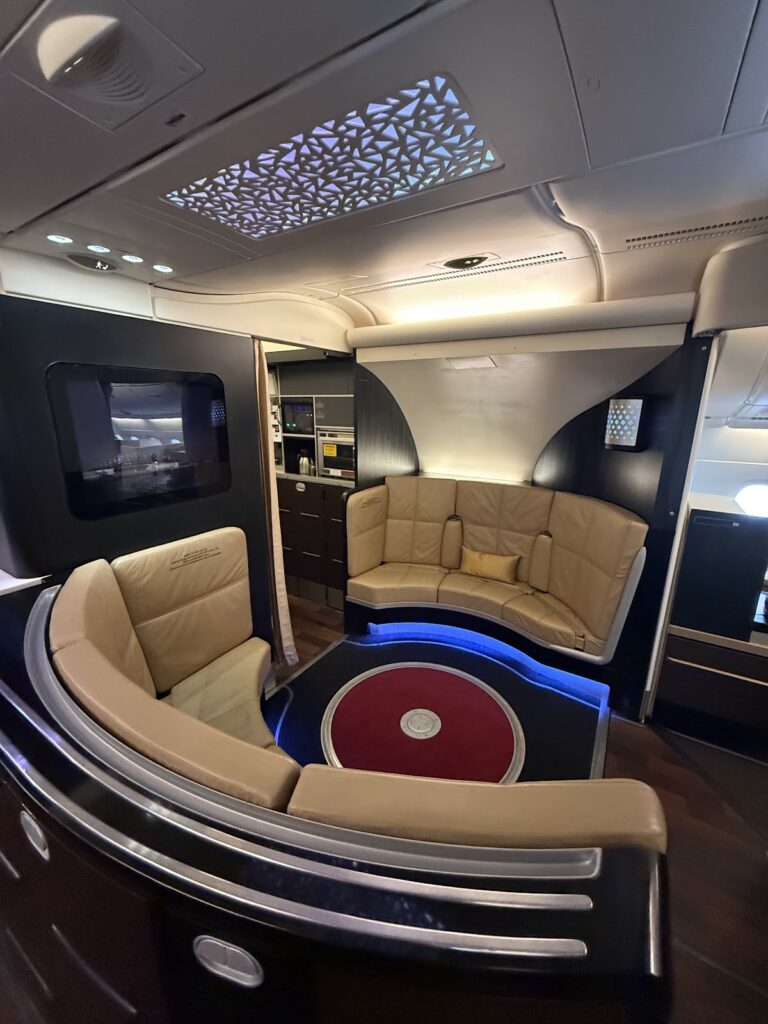 Etihad A380 Apartments onboard lounge with sofa and table