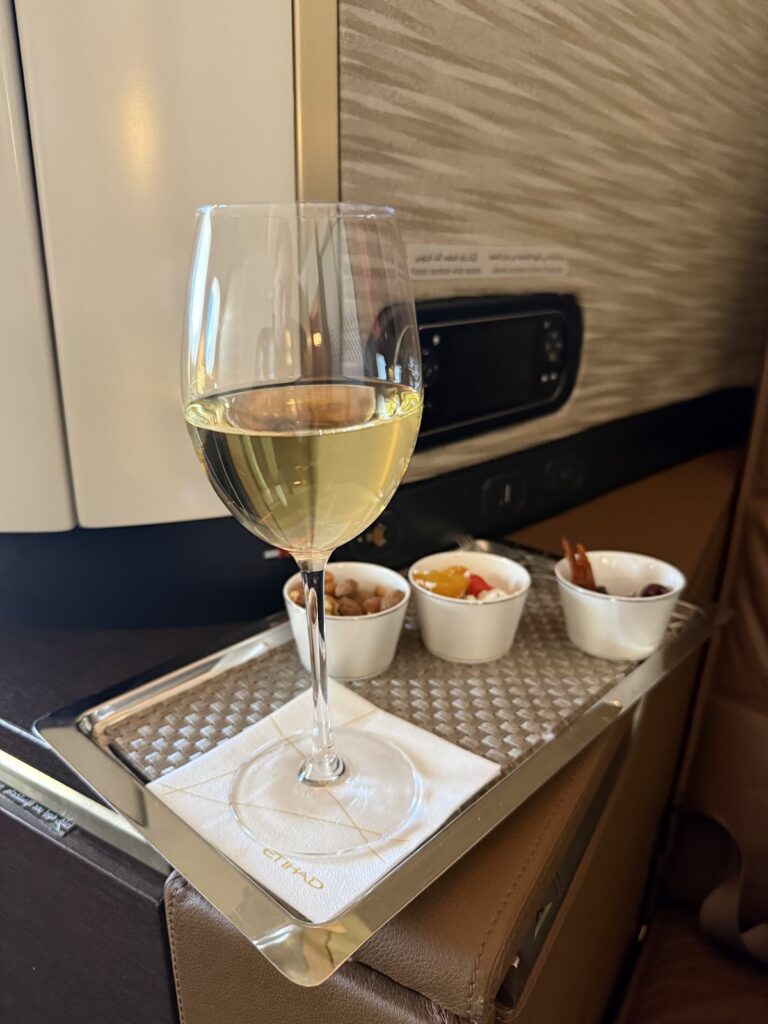White wine and canapés on Etihad A380 Apartments tray