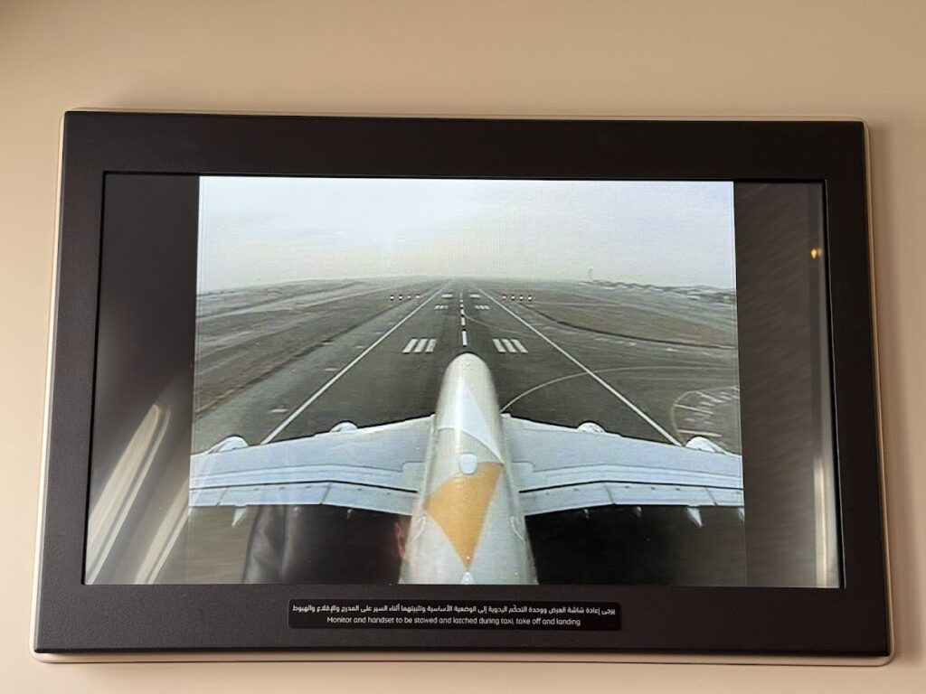 Tail camera view of A380 taxiing on runway