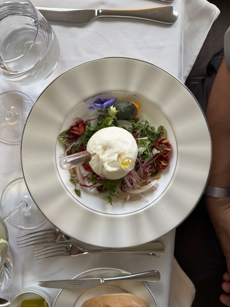 Burrata salad starter served in Etihad A380 Apartments