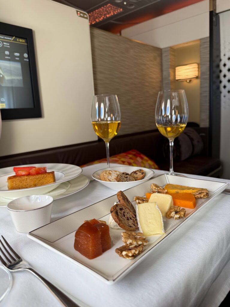 Cheese plate and dessert wine in Etihad A380 Apartments