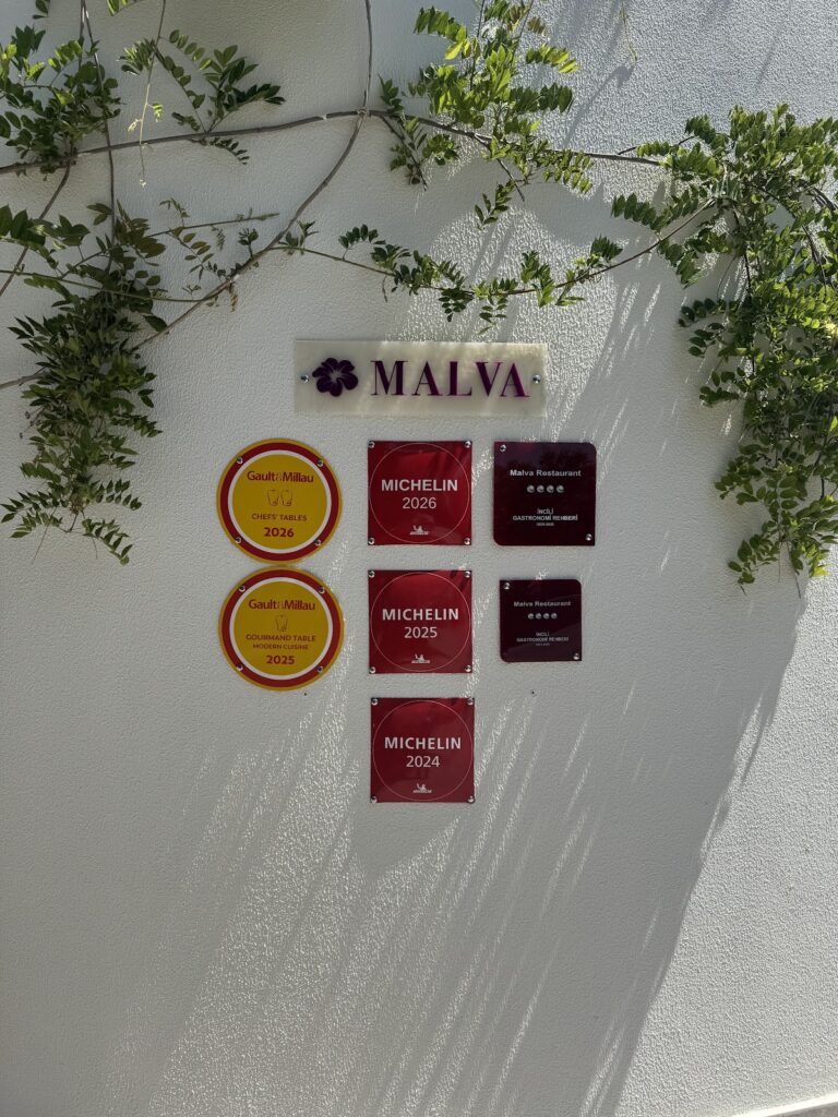 MALVA restaurant signage with Michelin and Gault-Millau award plaques