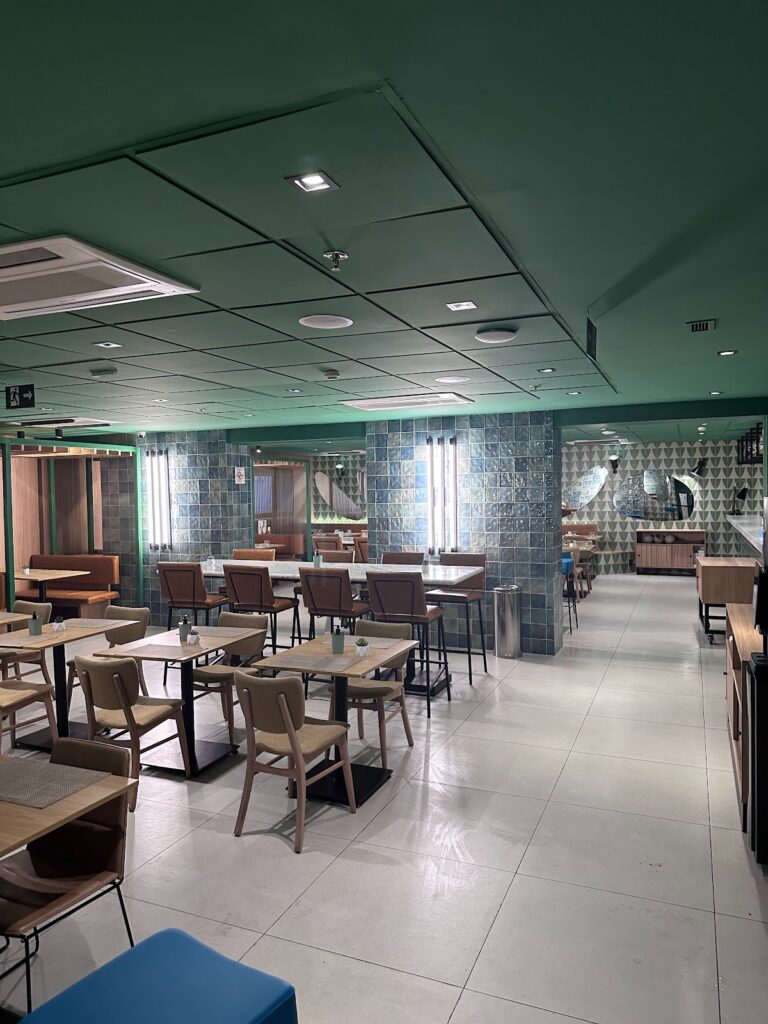 Breakfast dining area with green ceiling accents