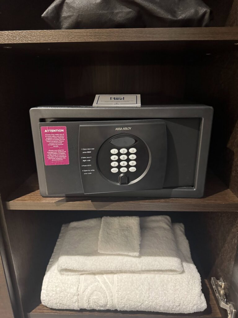 In-room safe with security notice in Hilton Canary Wharf
