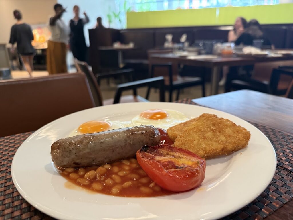 Full English breakfast with eggs, sausage, bacon