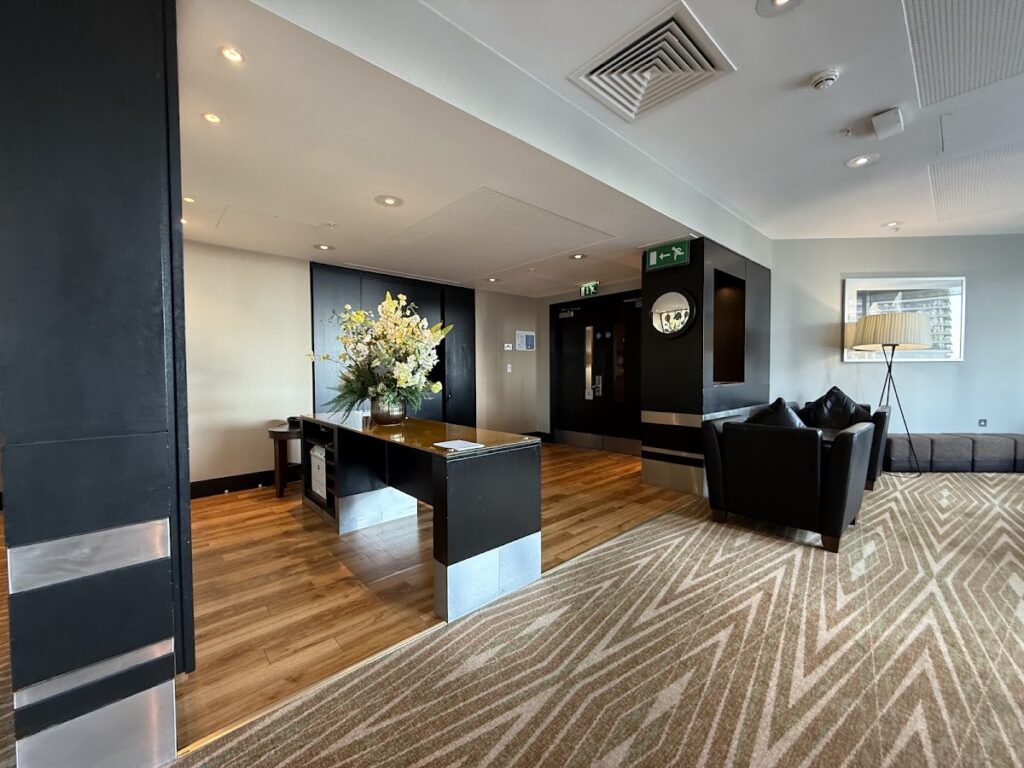 Hilton Canary Wharf executive lounge reception area with modern décor