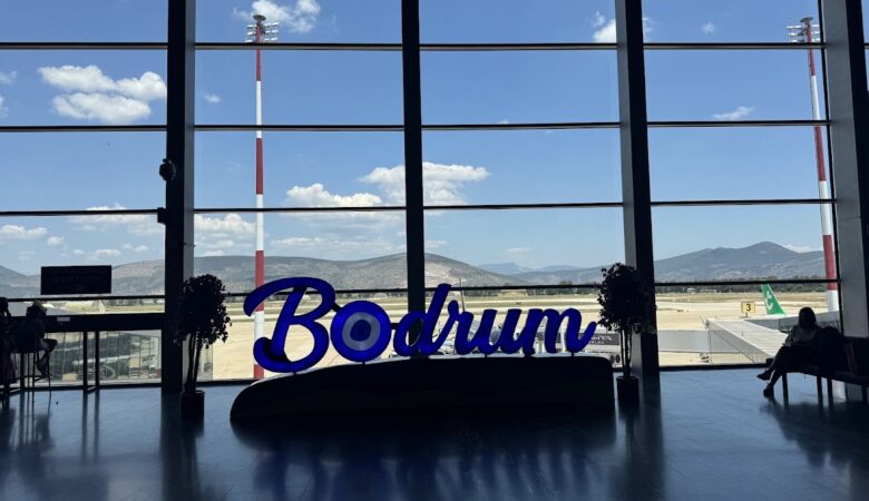 Bodrum Milas Airport signage with runway view
