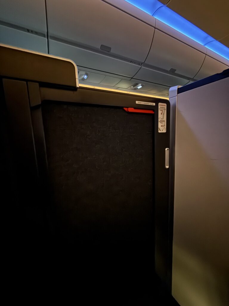 Club Suite sliding privacy door closed during flight