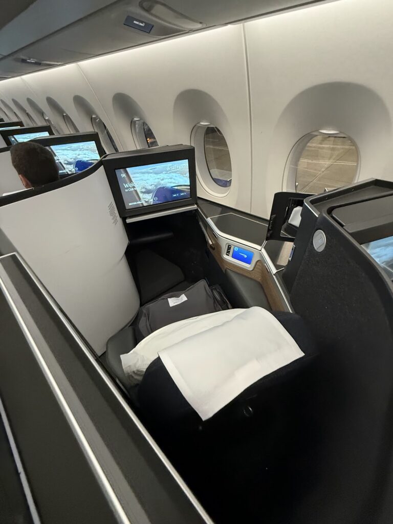 Two Club Suite seats with privacy dividers from above