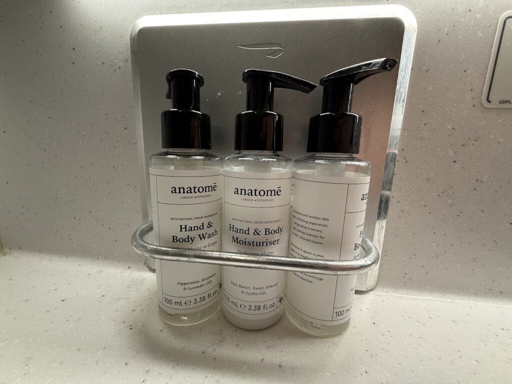 Amenity kit with toiletries in Club Suite lavatory