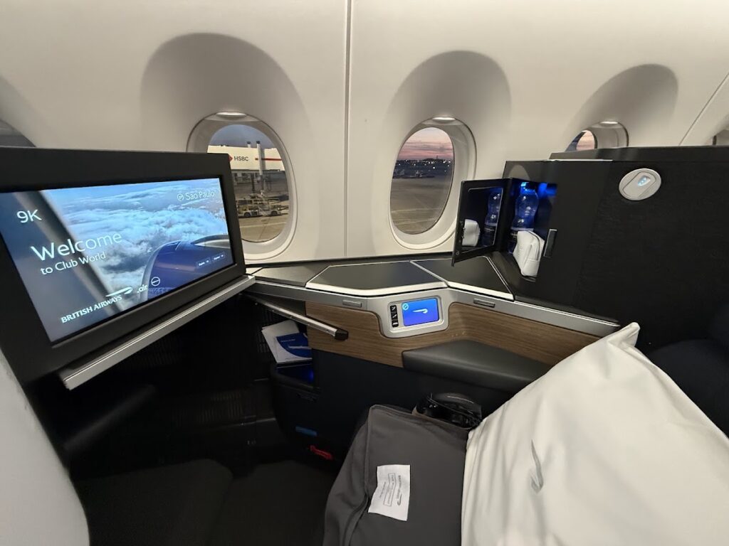 Club Suite seat 9K with welcome screen displayed