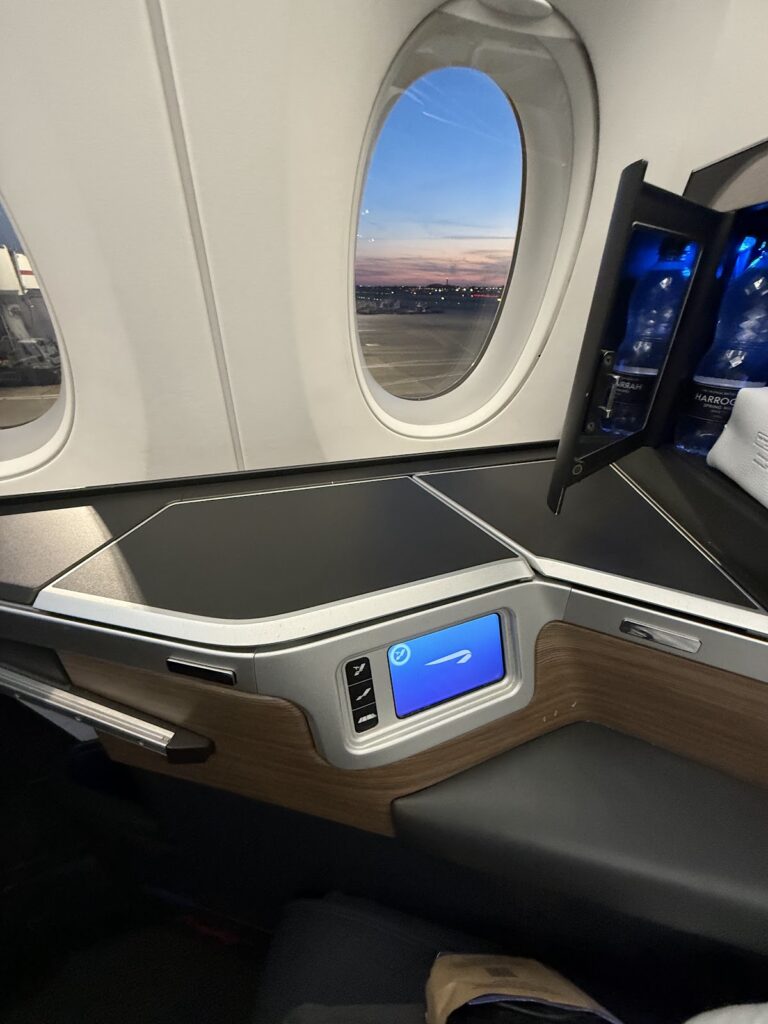 A350 window view during sunrise with control panel
