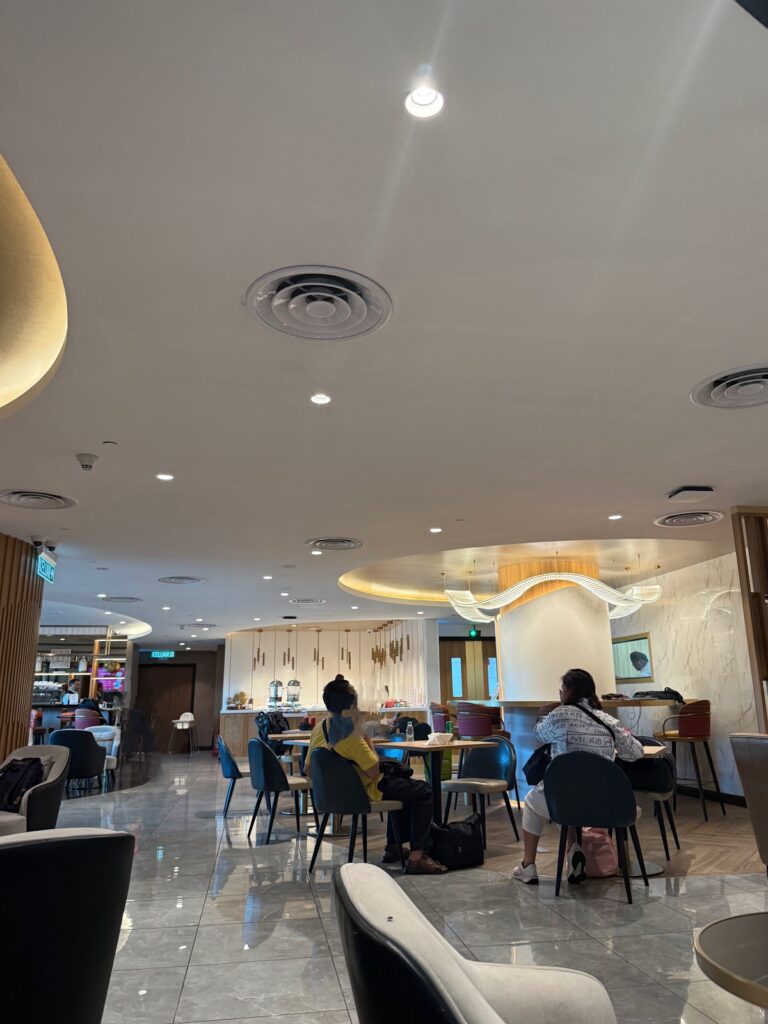 Malaysia Airlines business class lounge with modern seating