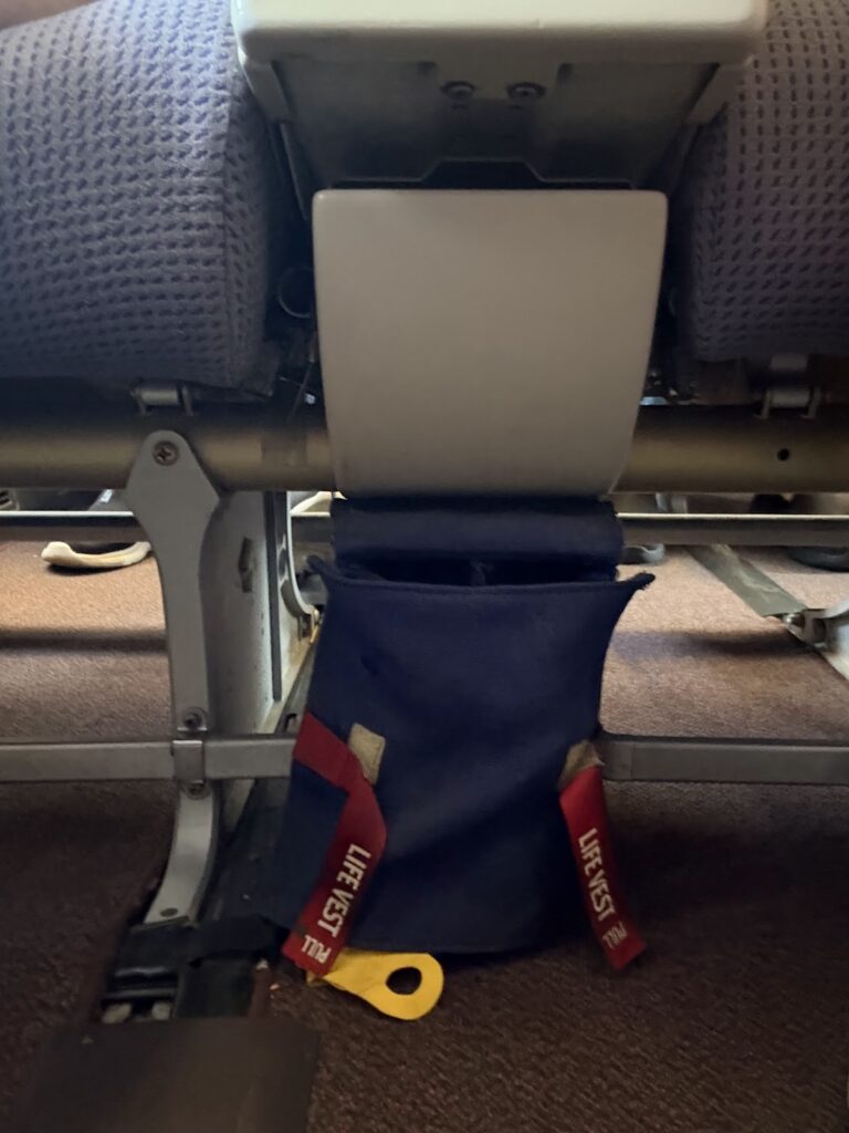 Seat-back pocket with safety card on Boeing 737