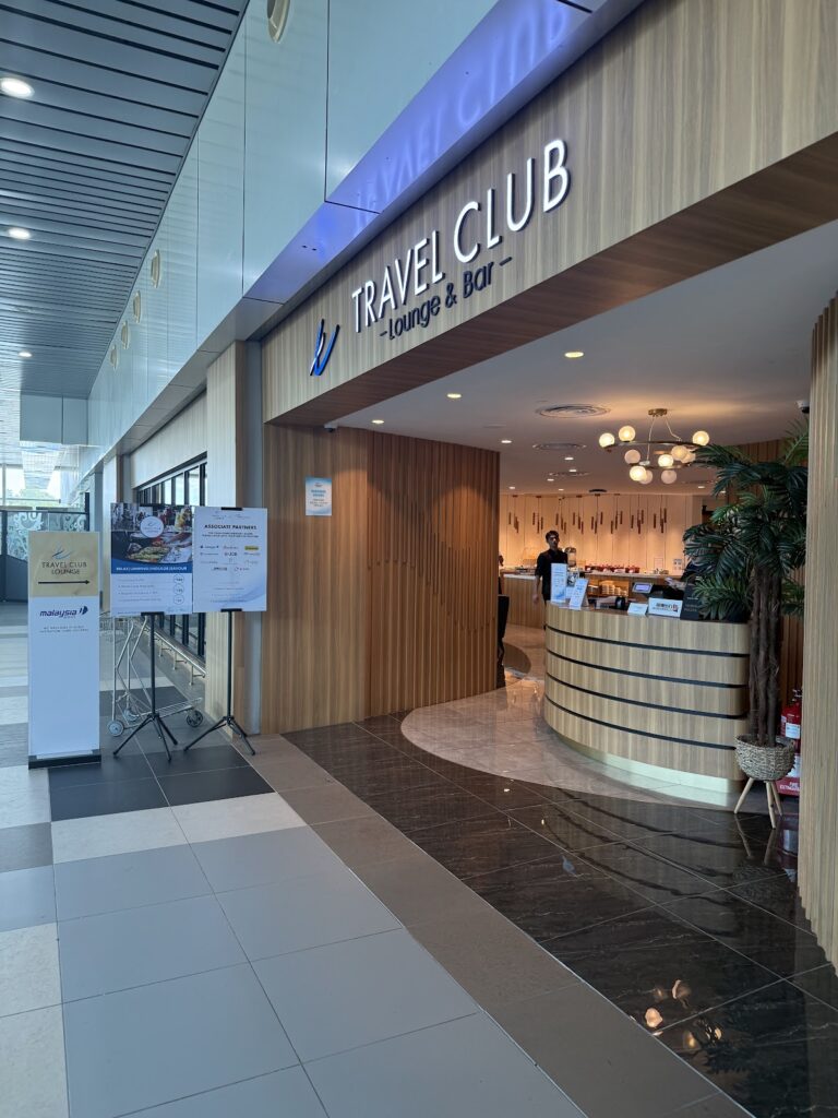 Malaysia Airlines Travel Club lounge entrance and reception desk