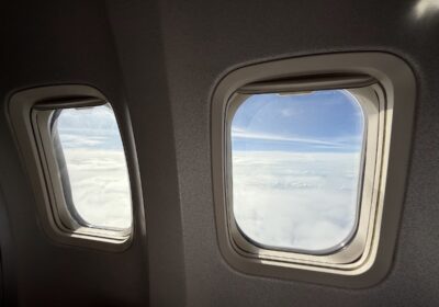 Boeing 737-800 windows showing clouds during flight