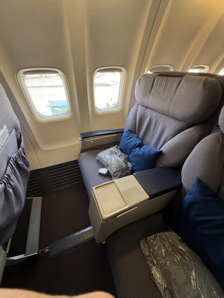 Single Malaysia Airlines business class seat with window view