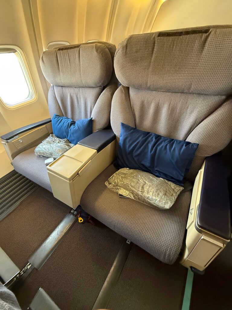 Malaysia Airlines short-haul business class seats with blue pillows