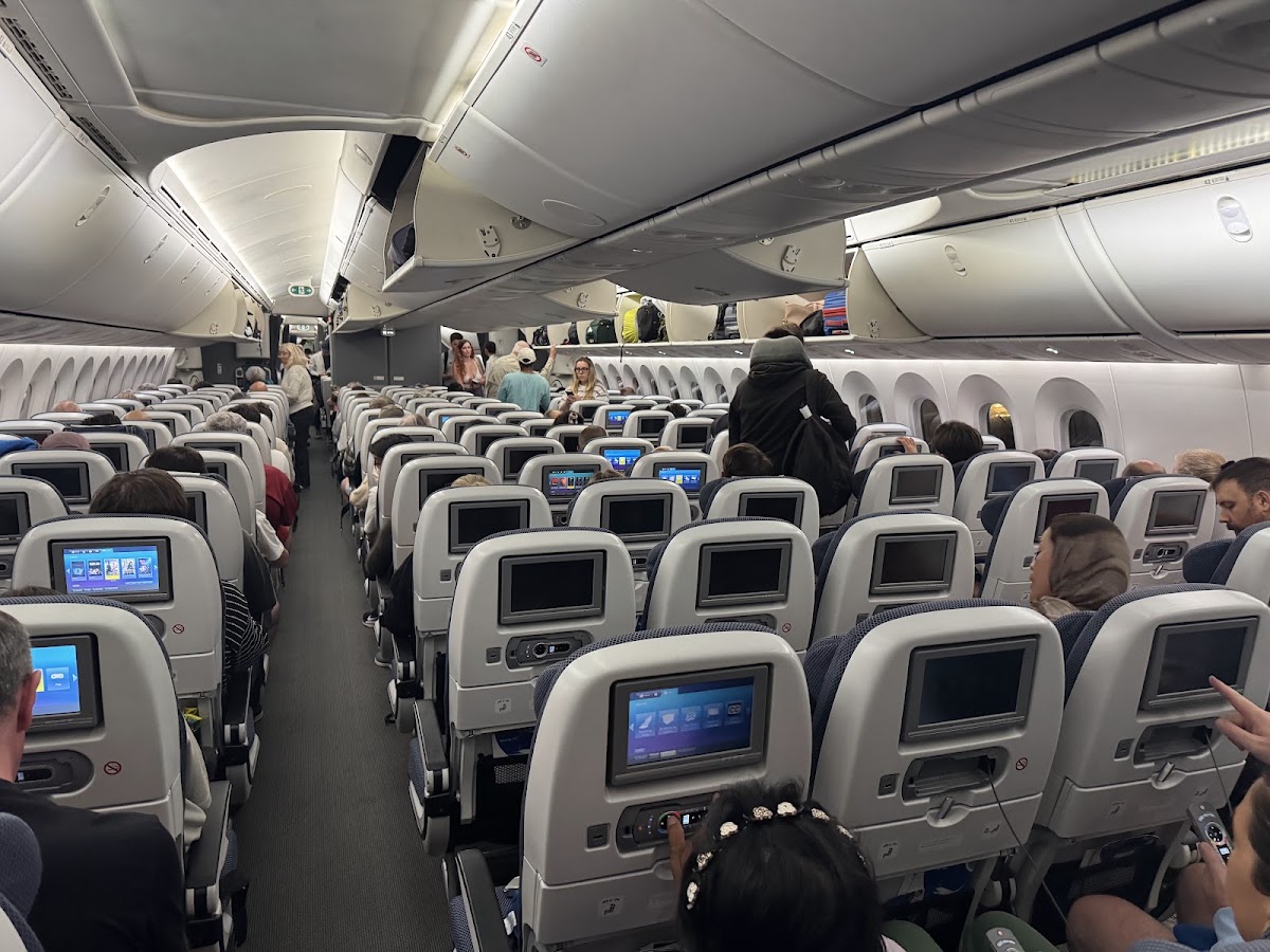 British Airways Economy Class cabin with rows of seats and