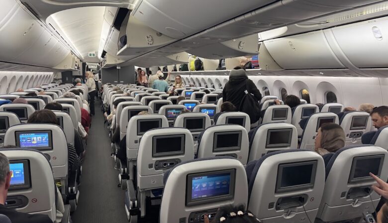 British Airways Economy Class cabin with rows of seats and