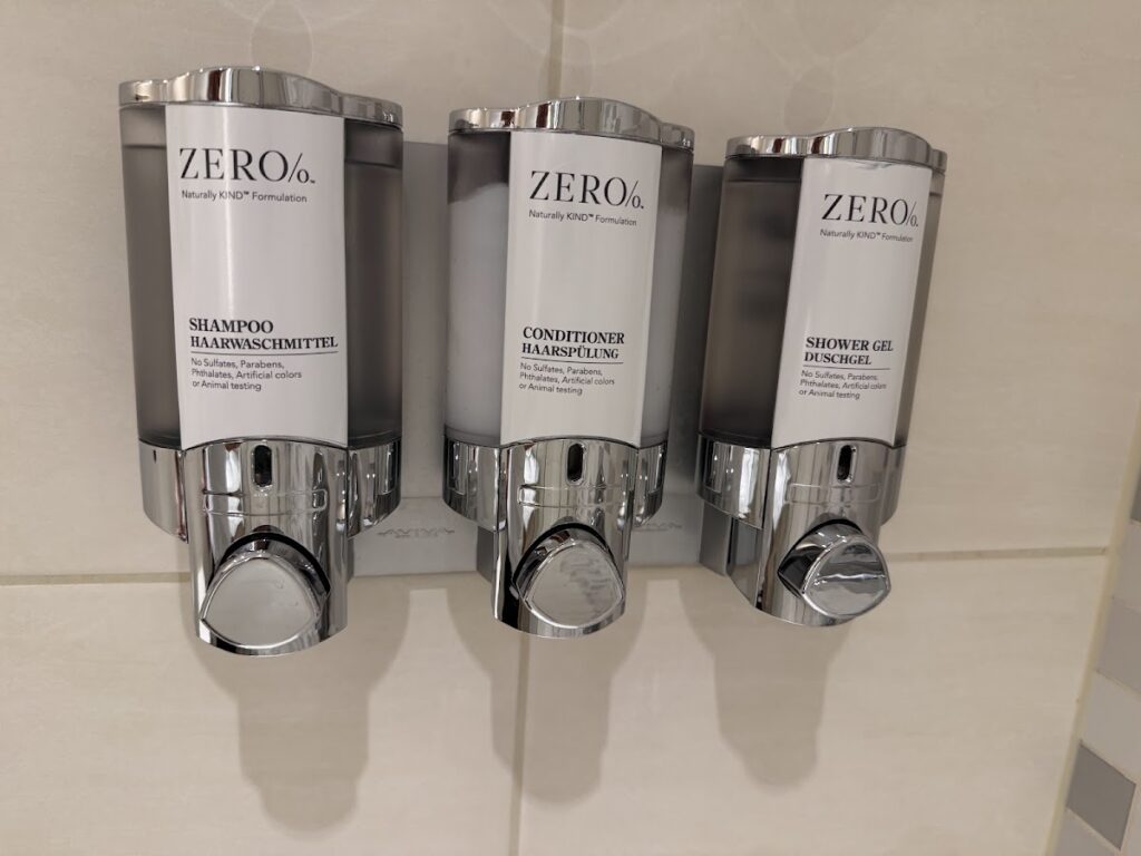 Bathroom amenities dispensers with Zero percent branded toiletries