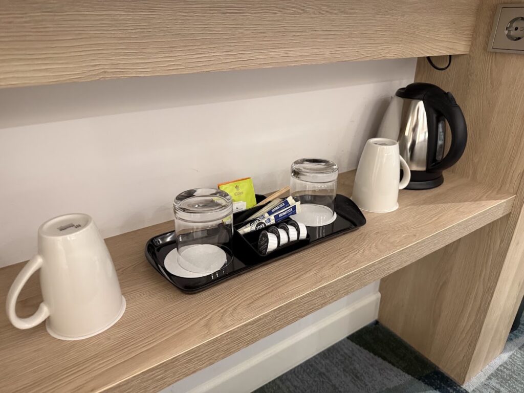 Coffee station and kettle on Hampton Berlin room shelf