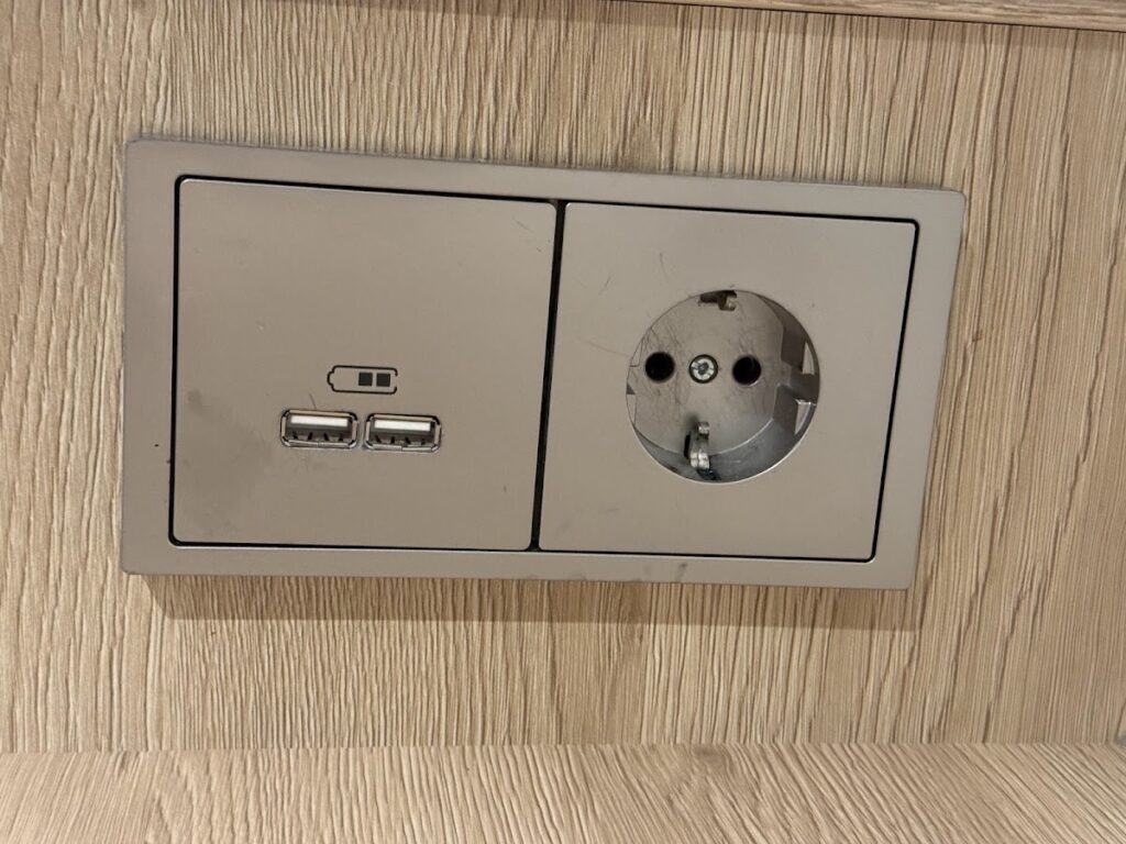 Wall outlet and USB charging ports
