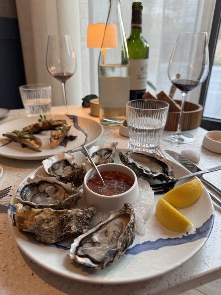 Oyster platter with wine at Grand Hotel dining