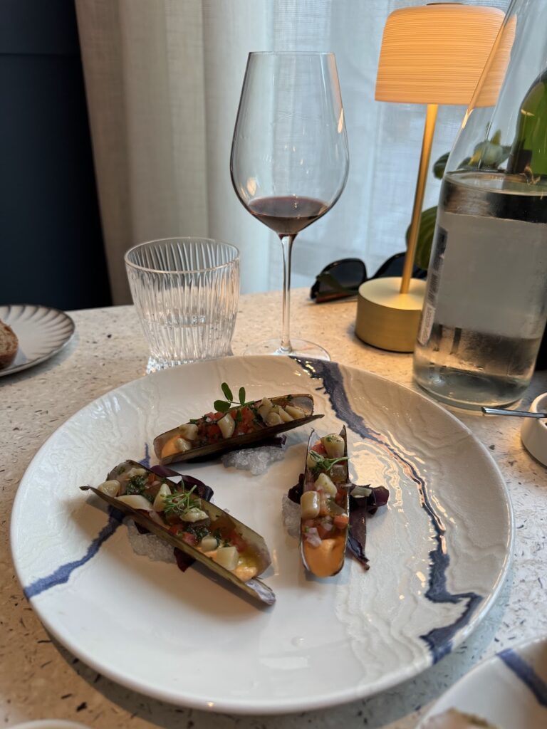Fine dining plate with wine at restaurant
