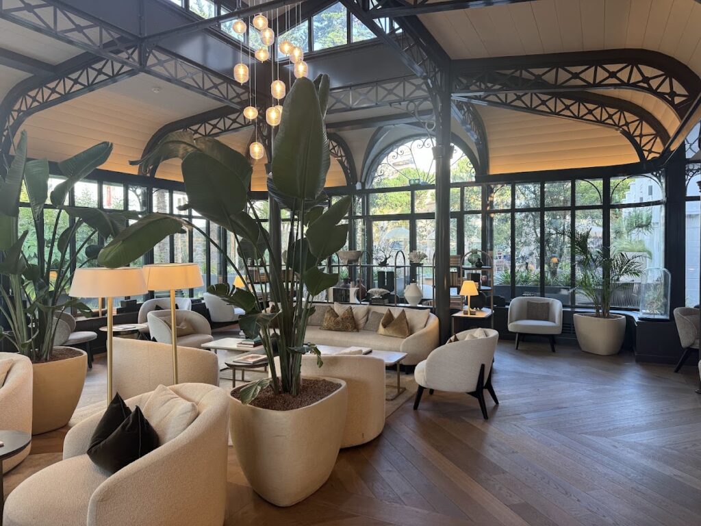 Grand Hotel de Courtoisville elegant lobby with modern furnishings