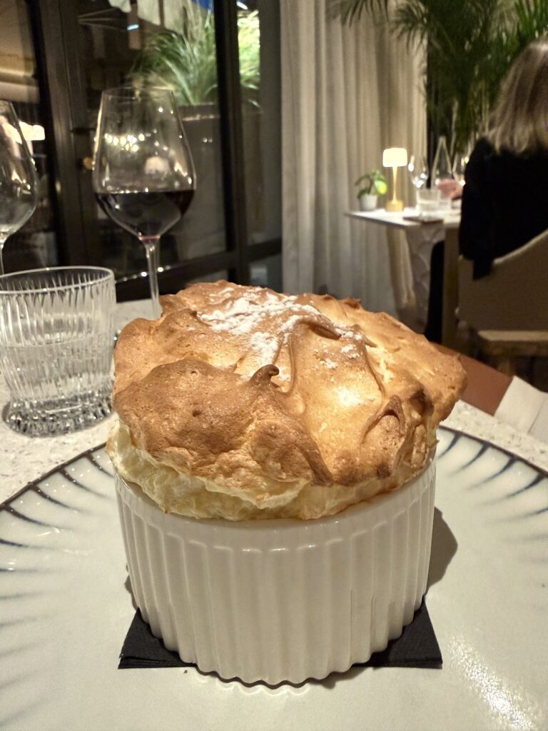 Gourmet soufflé dessert at Grand Hotel de Courtoisville